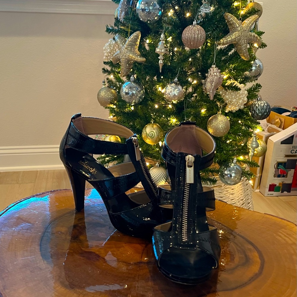 Michael Kors black patents zipper heels